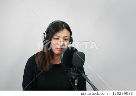 Woman (LGBTQ) singer sing a song with microphone 120289088