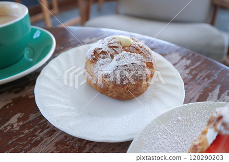 choux cream or cream puff, eclair and coffee choux cream or cream puff, eclair and coffee 120290203