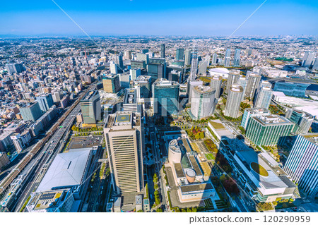 Yokohama cityscape in Japan: A panoramic view of Shinjuku and other downtown areas... Yokohama Station and the Minato Mirai buildings. Shadows of symbols also compete = 13th 120290959