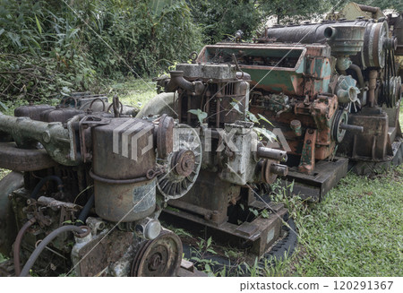 Rusty metal old machine in abandoned outdoor. Rusty metal old machine in abandoned outdoor. 120291367