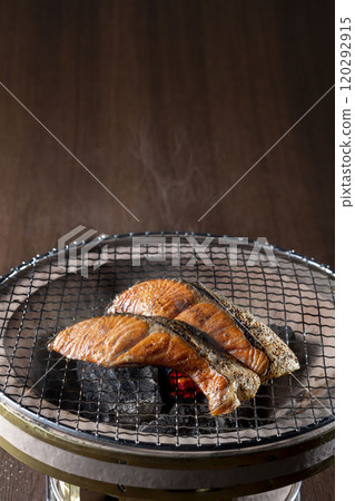 Delicious salmon grilled on a charcoal grill Delicious salmon grilled on a charcoal grill 120292915
