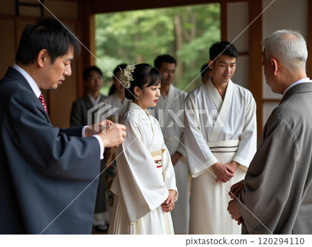Couple having a Shinto wedding ceremony 120294110