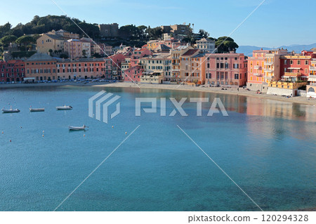 View from rock on Bay of Silence, fishing cove of town of Sestra Levante, Italy. Autumn, 2024. Tourism and recreation. Ecologically clean nature. Traditional old buildings. Historical center. 120294328