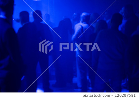 Group of people enjoying a vibrant night at a party Group of people enjoying a vibrant night at a party 120297581