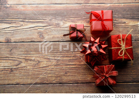 Assorted artisanal gift boxes on wooden background. Assorted artisanal gift boxes on wooden background. 120299513
