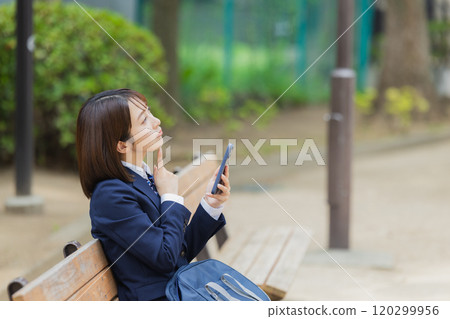 High school girl in the park High school girl in the park 120299956