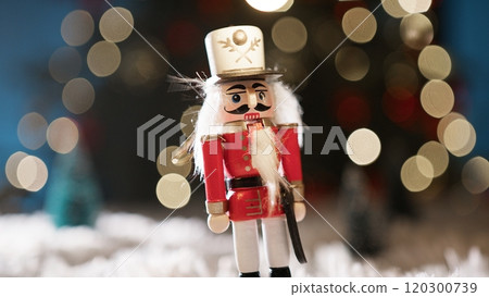 Christmas Nutcrackers Lined Up In Front Of The Tree 120300739