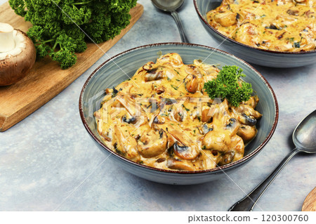 Fried mushrooms in a creamy sauce. Fried mushrooms in a creamy sauce. 120300760
