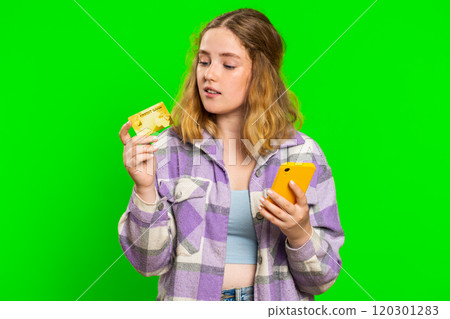 Woman use credit bank card smartphone while transferring spending money, purchases online shopping 120301283