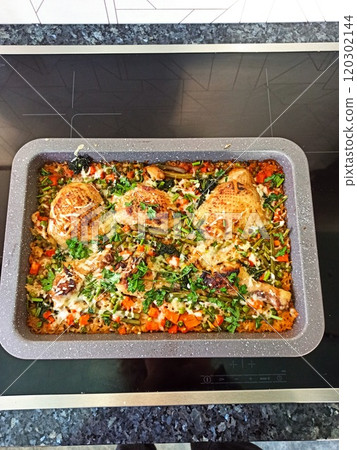Indian chicken curry with rice in supermarket packaging tray Indian chicken curry with rice in supermarket packaging tray 120302144