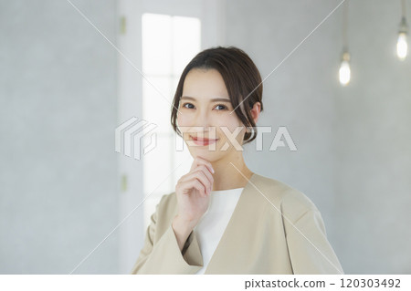 Young woman in a suit 120303492