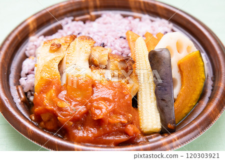 Delicious tomato sauce chicken steak and multigrain rice bento 120303921