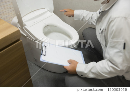 A woman requesting toilet repair A woman requesting toilet repair 120303956