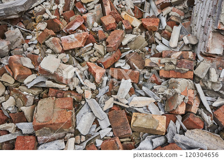 Rubbish on a construction site. Pile of broken bricks and slate. Rubbish on a construction site. Pile of broken bricks and slate. 120304656