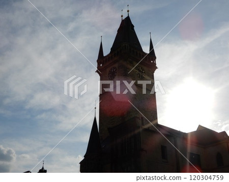 Prague astronomical clock and shining sun Prague astronomical clock and shining sun 120304759