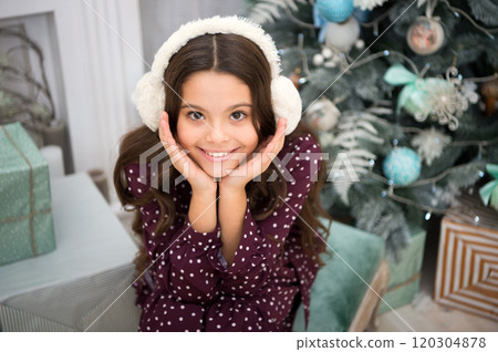 delivery christmas gifts. happy little girl celebrate winter holiday. christmas time. happy new year. Cute little child girl with xmas present. Merry Christmas and Happy New Year 120304878