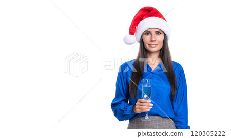 Celebrate New Year. Merry Christmas. Business woman in Santa hat celebrating and cheering. Party fun. Businesswoman at holiday. Businesswoman drink champagne in corporate Christmas party. Copy space 120305222
