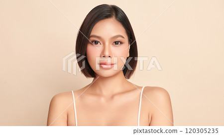Beautiful young asian woman with clean fresh skin on beige background, Face care, Facial treatment, Cosmetology, beauty and spa, Asian women portrait. 120305235