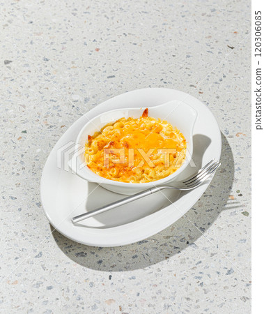 Portion of american dish mac and cheese Portion of american dish mac and cheese 120306085