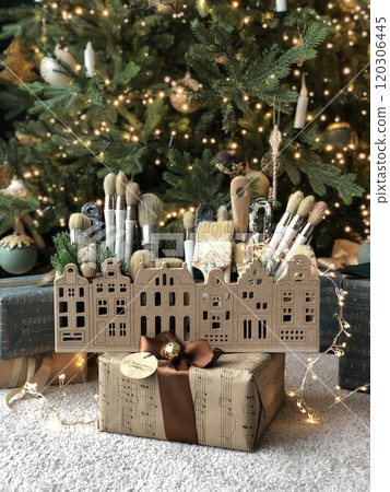 gingerbread in the form of a house decorated with gifts 120306445