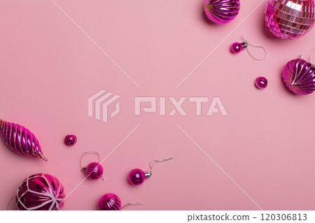 A set of minimalistic Christmas decorations made in one color on a light pink background. 120306813