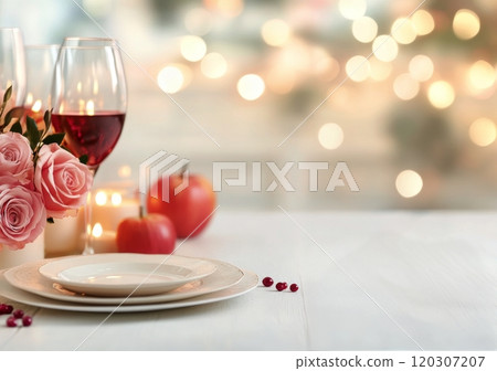 Romantic setting with roses, candles, and wine glasses for a cozy evening celebration 120307207