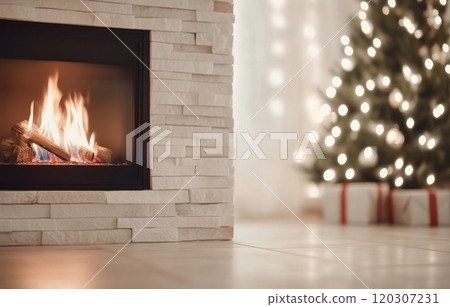Cozy fireplace with a glowing fire beside a decorated Christmas tree and wrapped gifts 120307231