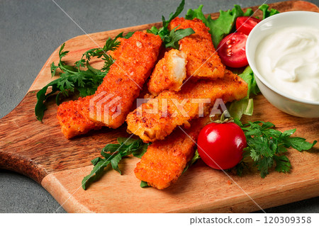 fried fish nuggets, with white sauce, arugula and cherry, no people, 120309358