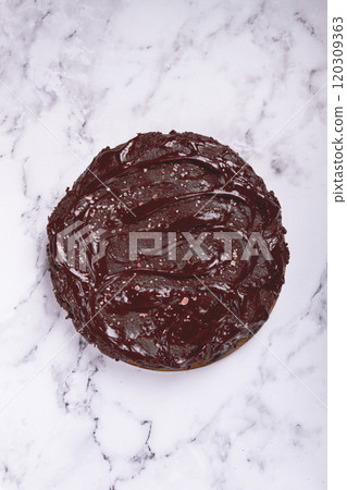 chocolate cake, round cake, on a marble light table, top view, homemade cakes, no people, chocolate cake, round cake, on a marble light table, top view, homemade cakes, no people, 120309363