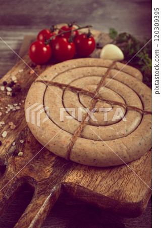 raw spiral sausages, on a wooden board, top view, no people, raw spiral sausages, on a wooden board, top view, no people, 120309395