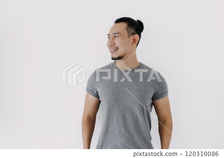 Good recommended pose of smile man in grey t-shirt isolate on white. 120310086