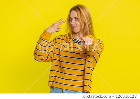 Young woman pointing at eyes and camera show I am watching you gesture spying, watching on someone 120310128