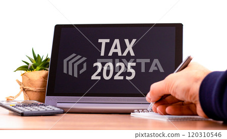 Planning tax 2025 new year symbol. Concept words Tax 2025 on beautiful black tablet. Beautiful white background. Businessman hand. Business tax 2025 new year concept. Copy space. 120310546