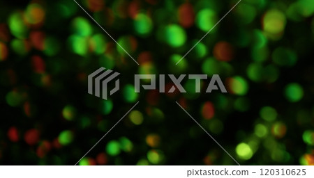 Bokeh shimmer. Colored highlights. Festive iridescence of flare spots dark surface. Bright speckled kaleidoscope with different power spotlight. 120310625