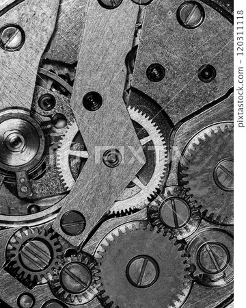 old mechanism on background of old metal cogwheels old mechanism on background of old metal cogwheels 120311118
