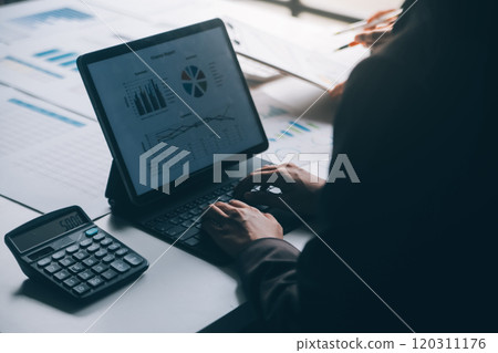 Accountant or banker making calculations Bookkeeper Clerk, Bank Advisor And Auditor. Accounting concept. 120311176