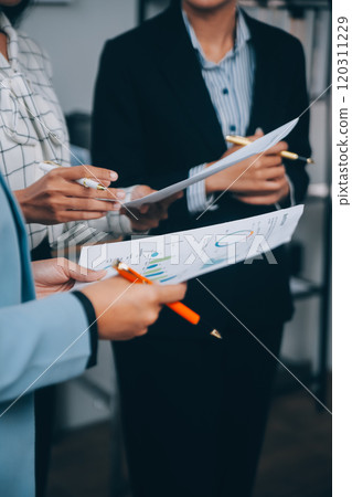 Fund managers team consultation and discuss about analysis Investment stock market at office 120311229