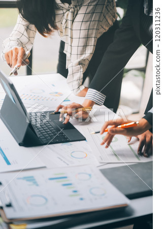 Fund managers team consultation and discuss about analysis Investment stock market at office 120311236