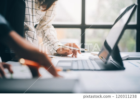 Fund managers team consultation and discuss about analysis Investment stock market at office 120311238