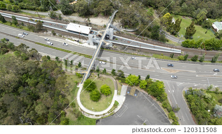 A local train station located near a major regional highway 120311508