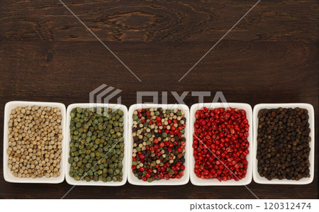 Bowls of assorted peppercorns Bowls of assorted peppercorns 120312474