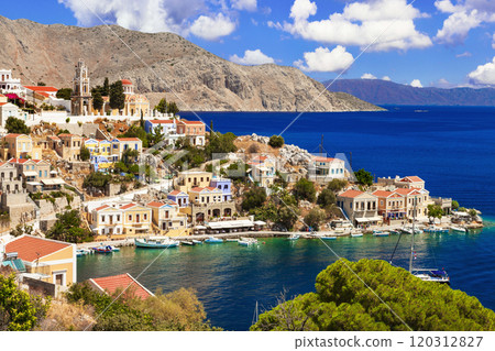 Greece travel. Traditional fishing Symi island with colorful houses, Dodecanese Greece travel. Traditional fishing Symi island with colorful houses, Dodecanese 120312827