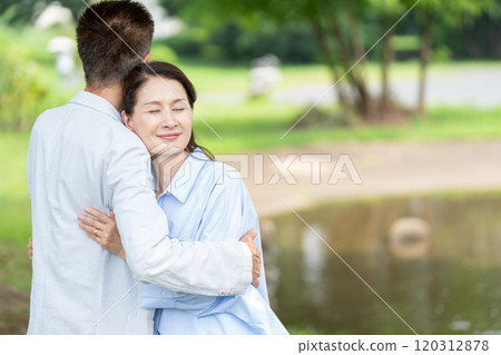 Senior couple with cuddling smile Senior couple with cuddling smile 120312878