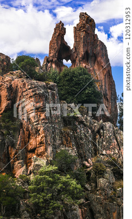 Corsica island, France. Amazing red rocks of Calanques de Piana. Rock with heart shape. Unique formations and national park  120312953