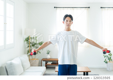 Young man training at home 120313505
