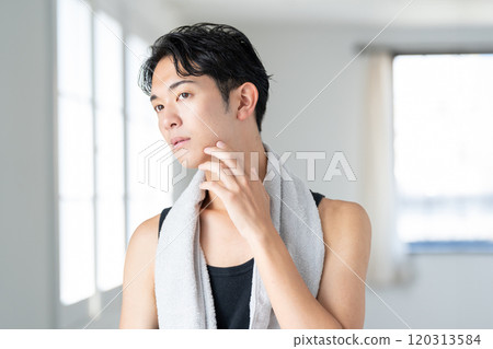 Young man shaving Young man shaving 120313584