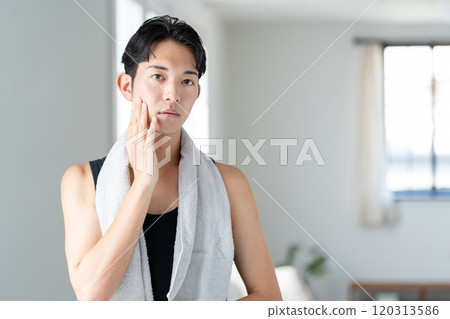 Young men doing skin care 120313586