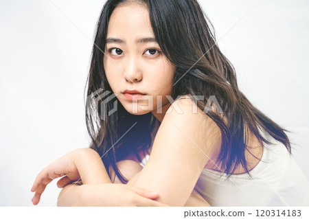 Beauty image of a young woman with an ennui expression Beauty image of a young woman with an ennui expression 120314183