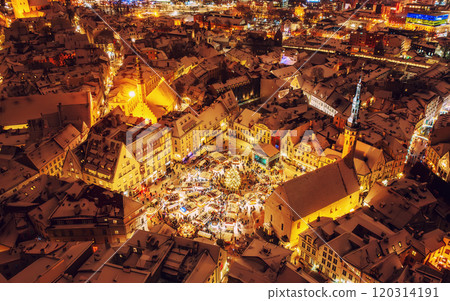 Aerial night View of Tallinn with the Town Hall Square in winter, roofs with snow, Christmas mood Aerial night View of Tallinn with the Town Hall Square in winter, roofs with snow, Christmas mood 120314191