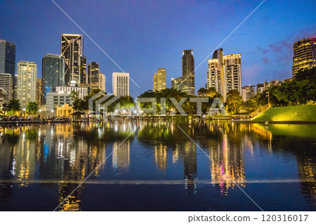 Lake in the evening, near by Twin Towers with city on background. Kuala Lumpur, Malaysia 120316017